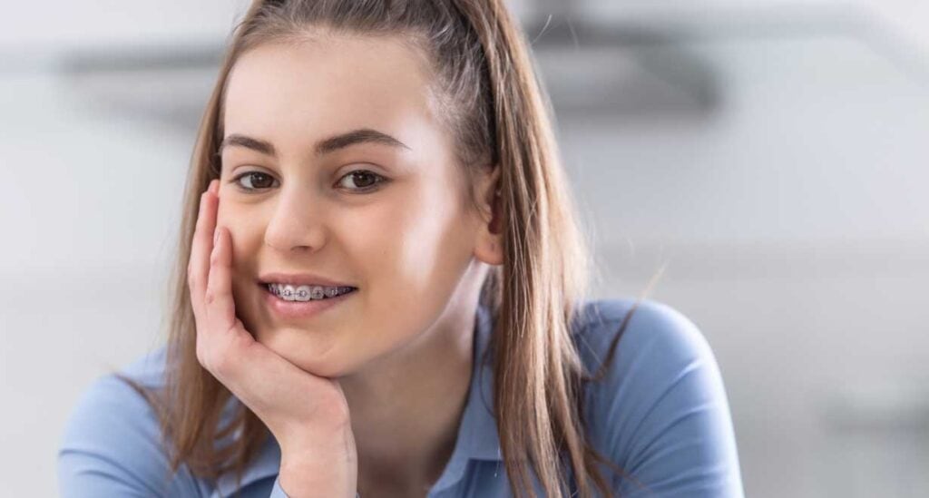 Smiling teen girl with braces